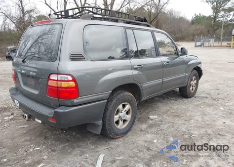 1999 Toyota Land Cruiser z USA, uszkodzony, nr VIN JT3HT05J9X0039454